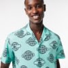 chemise lacoste globe print bleu clair